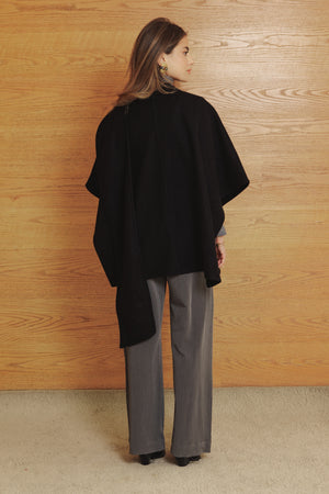 Asymmetric Cape in Black