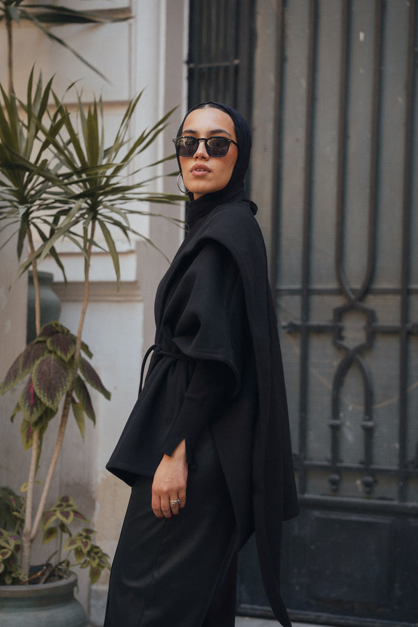 Asymmetric Cape in Black