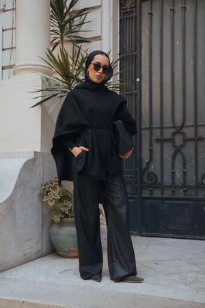 Asymmetric Cape in Black