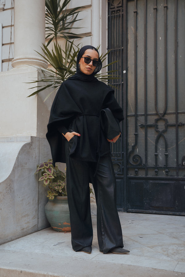 Asymmetric Cape in Black