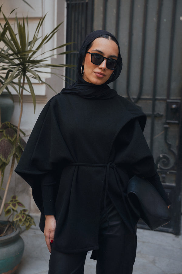 Asymmetric Cape in Black